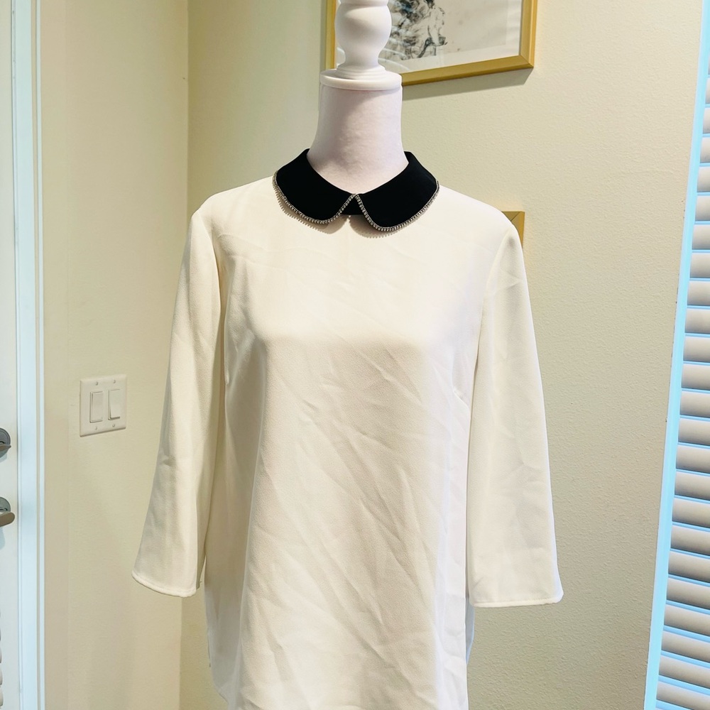 Elegant White Blouse with Black Collar